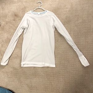 Tight white long sleeve shirt